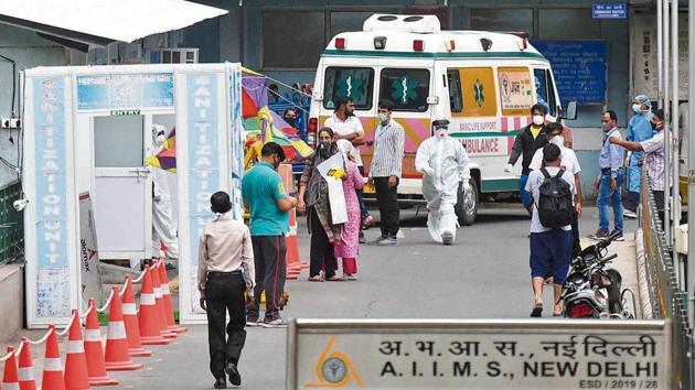People arrive outside the emergency ward at AIIMS on Thursday.