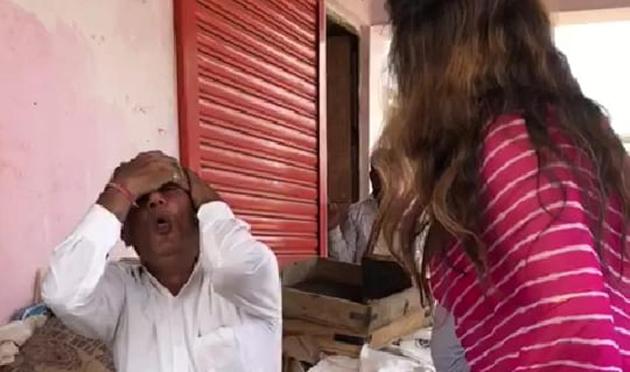 Videos of her slapping and hitting Sultan Singh with a slipper were widely circulated on social media as police personnel at the spot remained mute spectators.(HT PHOTO)
