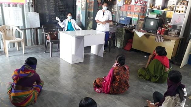 Migrants during one of the counselling sessions at a shelter in Pune district. (HT PHOTO) Migrants during one of the counselling sessions at a shelter in Pune district. (HT PHOTO)