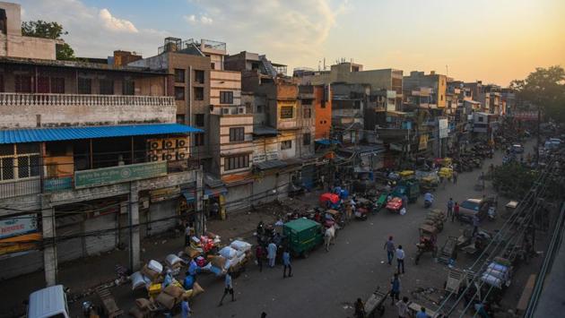 The Khari Baoli wholesale market in New Delhi springs back to life after lockdown relaxations on June 2. The Delhi government noted that while most migrants had left for their homes in the past month, others had decided to stay back with lockdown restrictions were slowly being eased and the economy opening up. (Amal KS / HT Photo)