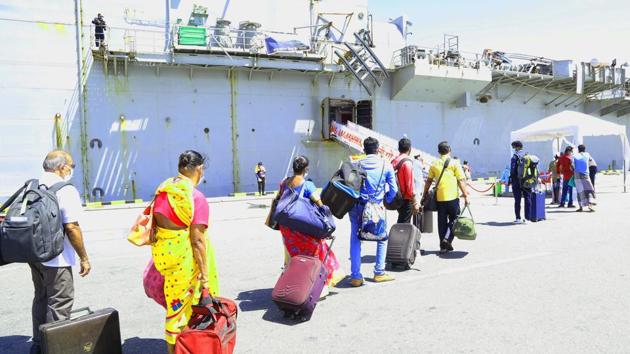A queue of 700 Indian nationals waited to board Indian Navy ship INS Jalashwa in Colombo. (ANI) A queue of 700 Indian nationals waited to board Indian Navy ship INS Jalashwa in Colombo. (ANI)
