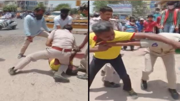 The video of an incident involving a Jodhpur cop trying to contain an accused has gone viral on social media. (Screengrab) The video of an incident involving a Jodhpur cop trying to contain an accused has gone viral on social media. (Screengrab)
