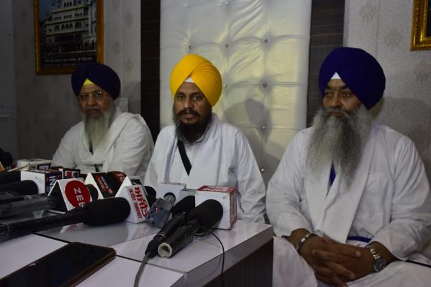 (From left) Shiromani Gurdwara Parbandhak Committee (SGPC) president Gobind Singh Longowal, Akal Takht acting jathedar Giani Harpreet Singh and Takht Keshgarh Sahib acting jathedar Giani Raghbir Singh during a media interaction at the Akal Takht secretariat in Amritsar on Saturday. (Sameer Sehgal/HT)