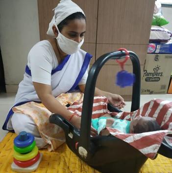 Shalini Suresh Wadkar, a caretaker at Shreevatsa Child Care Institute, stays at the centre for 15 days at a stretch to take care of the children. (HT PHOTO) Shalini Suresh Wadkar, a caretaker at Shreevatsa Child Care Institute, stays at the centre for 15 days at a stretch to take care of the children. (HT PHOTO)
