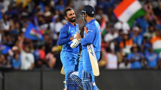 Dinesh Karthik of India celebrates with MS Dhoni of India(Getty Images)