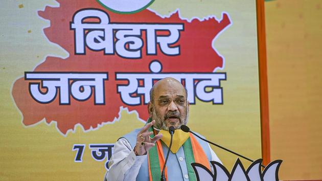 Union Home Minister Amit Shah addresses 'Bihar Jan Samwad Rally' via video conferencing, at party headquarters in New Delhi, Sunday.(PTI)