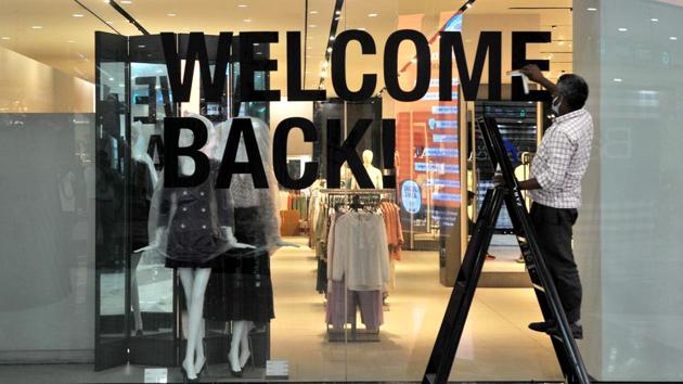 A staff cleans the premises of Elante Mall in Chandigarh ahead of its reopening. Only asymptomatic customers or visitors will be allowed in shopping malls and the number of customers inside each shop has to be kept to a minimum. (Ravi Kumar / HT Photo)