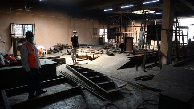 Workers pictured while rebuilding furnaces to meet the increase in demand for cremations due to the coronavirus pandemic. The rising number of bodies arriving from hospitals has forced the facility, situated next to the city’s historic Red Fort, to extend its operational hours. (Sajjad Hussain / AFP)