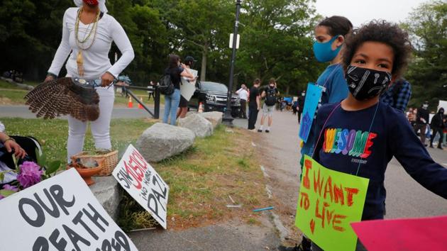 Children join a rally following the death in Minneapolis police custody of George Floyd, in Boston, Massachusetts, US.(REUTERS) Children join a rally following the death in Minneapolis police custody of George Floyd, in Boston, Massachusetts, US.(REUTERS)