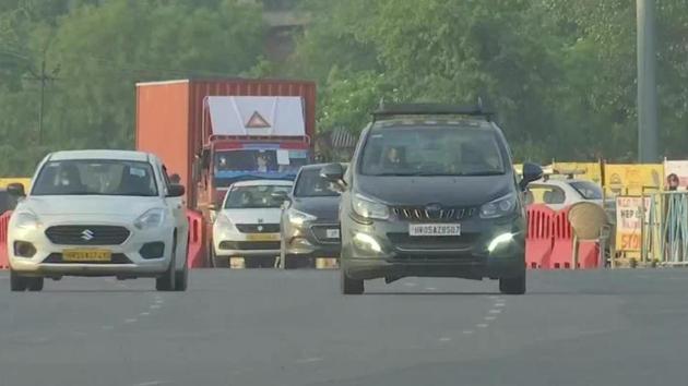 The traffic was smooth at the Delhi-Gurugram border on Monday morning. (ANI Photo) The traffic was smooth at the Delhi-Gurugram border on Monday morning. (ANI Photo)