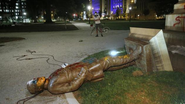The statue of Confederate Gen. Williams Carter Wickham lies on the ground after protesters pulled it down Saturday, June 6, 2020, in Monroe Park in Richmond, Va. The statue had stood in the park since 1891. (Representational) (AP) The statue of Confederate Gen. Williams Carter Wickham lies on the ground after protesters pulled it down Saturday, June 6, 2020, in Monroe Park in Richmond, Va. The statue had stood in the park since 1891. (Representational) (AP)