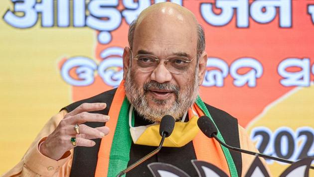 Union Home Minister Amit Shah addresses 'Odisha Jan Samwad ' rally via video conferencing during the ongoing Covid-19 lockdown at BJP headquarters in New Delhi on Monday.(PTI Photo)