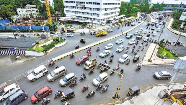 Vehicles at Sancheti chowk on Monday during rush hour, as offices opened for business after close to three months. (Pratham Gokhale/HT Photo) Vehicles at Sancheti chowk on Monday during rush hour, as offices opened for business after close to three months. (Pratham Gokhale/HT Photo)