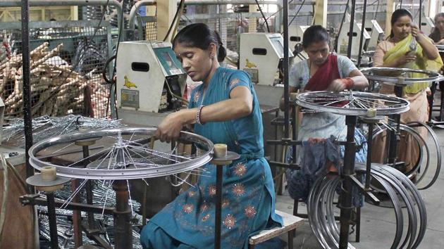Workers in one of the cycle manufacturing units in Ludhiana.(JS Grewal/HT File Photo)