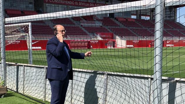 Sevilla's President Jose Castro speaks on the phone at the sport center of Sevilla in Seville, Spain. (AP) Sevilla's President Jose Castro speaks on the phone at the sport center of Sevilla in Seville, Spain. (AP)
