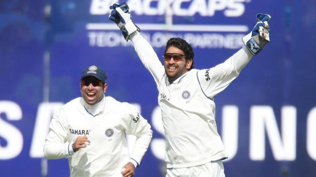 MS Dhoni of India celebrates with team mate VVS Laxman catching out Jesse Ryder of New Zealand during day two of the Third Test match between New Zealand and India at the Basin Reserve on April 4, 2009 in Wellington, New Zealand. (Photo by Marty Melville/Getty Images)(Getty Images) MS Dhoni of India celebrates with team mate VVS Laxman catching out Jesse Ryder of New Zealand during day two of the Third Test match between New Zealand and India at the Basin Reserve on April 4, 2009 in Wellington, New Zealand. (Photo by Marty Melville/Getty Images)(Getty Images)
