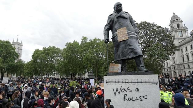 Photos: Ire Turns To Colonial Era Statues In Anti-racism Protests ...