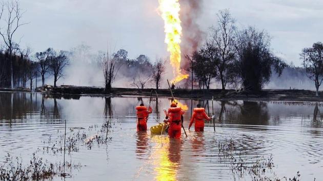 Smoke could be seen billowing from the well several kilometres away from the site close to Dibru Saikhowa National Park and the eco-sensitive Maguri Mottapung wetland. (NDRF) Smoke could be seen billowing from the well several kilometres away from the site close to Dibru Saikhowa National Park and the eco-sensitive Maguri Mottapung wetland. (NDRF)
