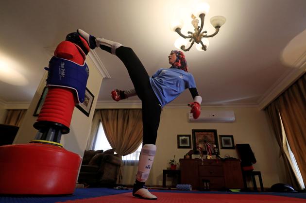 Hedaya Malak Wahba, Egyptian Taekwondo practitioner and 2016 Rio Olympics bronze medallist, works out at her home as she trains for the postponed Tokyo Olympic Games amid the spread of the coronavirus disease (COVID-19), in Cairo, Egypt June 4, 2020. Picture taken June 4, 2020. (REUTERS)