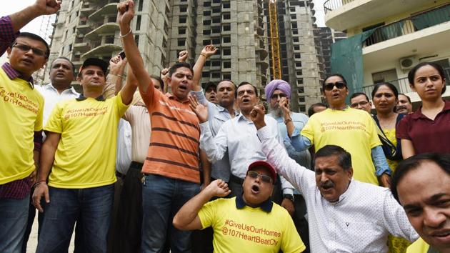 In this file picture from May 2017, home buyers of Amrapali HeartBeat, protest inside Amrapali Project Sector 107, in Noida.(Virendra Singh Gosain/HTFile Photo)