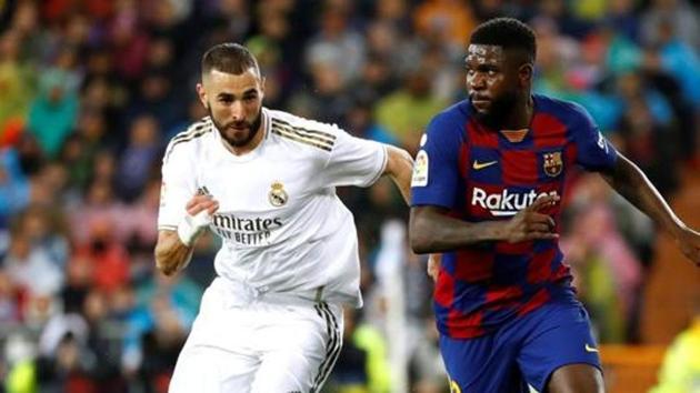 File photo: Barcelona's Samuel Umtiti in action with Real Madrid's Karim Benzema(REUTERS) File photo: Barcelona's Samuel Umtiti in action with Real Madrid's Karim Benzema(REUTERS)