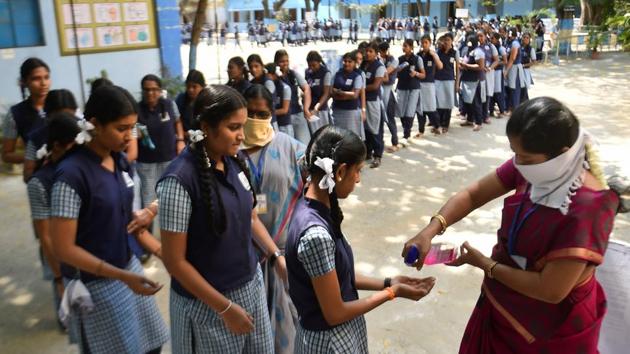 Students being provided with hand sanitisers before appearing for Class 12 exam in Chennai in this file photo. (PTI Photo) Students being provided with hand sanitisers before appearing for Class 12 exam in Chennai in this file photo. (PTI Photo)