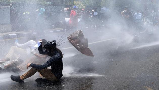 Police use water cannon to disperse demonstrators. Ten demonstrators who gathered near the Prime Minister's residence were arrested by the police, reported AFP. (Prakash Mathema / AFP) Police use water cannon to disperse demonstrators. Ten demonstrators who gathered near the Prime Minister's residence were arrested by the police, reported AFP. (Prakash Mathema / AFP)