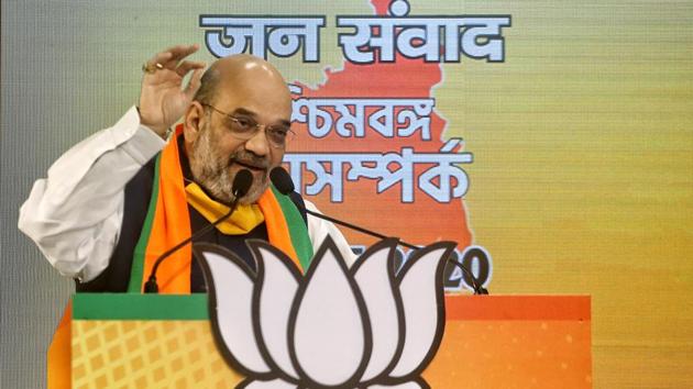 Union home minister and BJP leader Amit Shah addressing ‘West Bengal Jan-Samvad Rally’ through video conferencing in New Delhi on Tuesday.(ANI Photo)