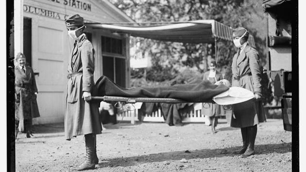 This Library of Congress photo shows a demonstration at the Red Cross Emergency Ambulance Station in Washington, D.C., during the influenza pandemic of 1918. (AP) This Library of Congress photo shows a demonstration at the Red Cross Emergency Ambulance Station in Washington, D.C., during the influenza pandemic of 1918. (AP)