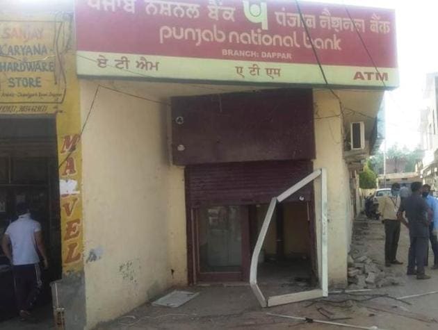 The Punjab National Bank kiosk from where an ATM was uprooted, in Lalru, Mohali, in wee hours of Wednesday.(HT Photo) The Punjab National Bank kiosk from where an ATM was uprooted, in Lalru, Mohali, in wee hours of Wednesday.(HT Photo)