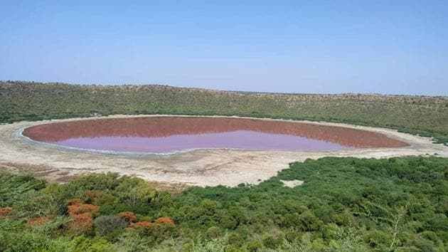 Located around 500 km from Mumbai, the Lonar lake in Buldhana district is a popular tourist hub and also attracts scientists from all over the world.(Twitter/MRDAGAJEE) Located around 500 km from Mumbai, the Lonar lake in Buldhana district is a popular tourist hub and also attracts scientists from all over the world.(Twitter/MRDAGAJEE)
