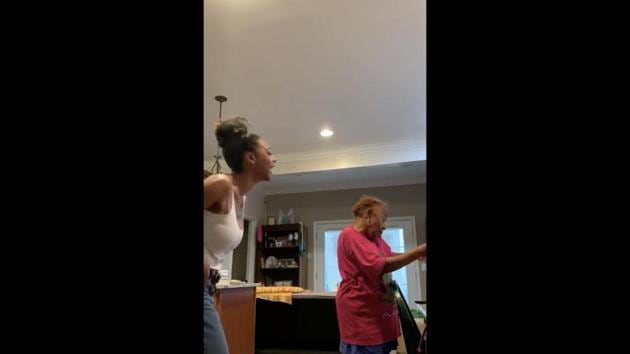 Daughter Mel showing her mum, who is on the phone, an acceptance letter she received from law school. (Twitter/@ladyfromdalou) Daughter Mel showing her mum, who is on the phone, an acceptance letter she received from law school. (Twitter/@ladyfromdalou)