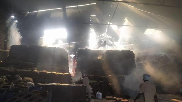 The feed godown where the fire broke out in Khanna on Wednesday.(HT Photo)