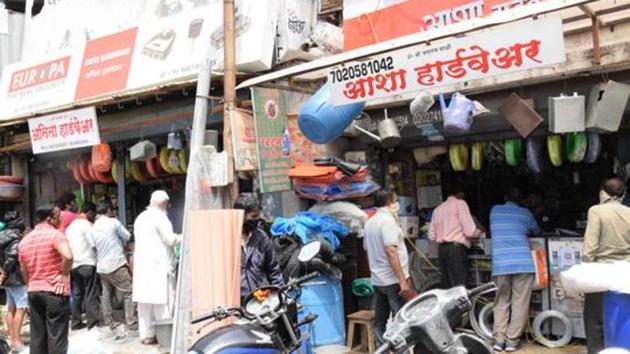 People are seen outside hardware shops after lockdown relaxations. The Aundh-Baner area, which was on the verge of being declared a green zone, as of June 6, has 97 progressive Covid-19 cases, of which 80 are active cases. (HT PHOTO) People are seen outside hardware shops after lockdown relaxations. The Aundh-Baner area, which was on the verge of being declared a green zone, as of June 6, has 97 progressive Covid-19 cases, of which 80 are active cases. (HT PHOTO)