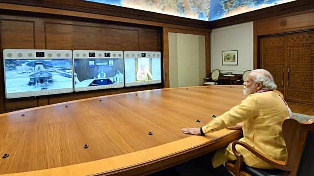 Prime Minister Narendra Modi conducted a review of the Kedarnath Math development and reconstruction project with the Uttarakhand state government via video conferencing, in New Delhi on Wednesday. (ANI Photo) Prime Minister Narendra Modi conducted a review of the Kedarnath Math development and reconstruction project with the Uttarakhand state government via video conferencing, in New Delhi on Wednesday. (ANI Photo)
