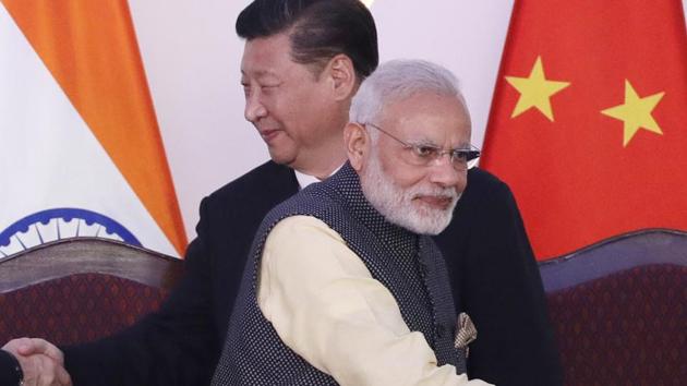 Prime Minister Narendra Modi and Chinese President Xi Jinping at the BRICS summit in Goa in October 2016. (AP File Photo) Prime Minister Narendra Modi and Chinese President Xi Jinping at the BRICS summit in Goa in October 2016. (AP File Photo)