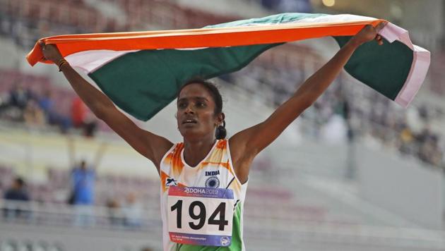 India's Gomathi Marimuthu celebrates after winning gold in the women's 800-meters final race at the Asian Athletics Championships in Doha.(AP)