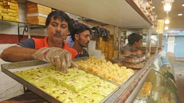“Immunity is the only way we can fight coronavirus. There is no vaccine yet, so we have come up with this sweet that is made of 15 different spices. Each sandesh costs Rs 25,” Sudipta Mullick, the shop’s owner, said, according to news agency ANI.(Samir Jana/HT file photo)