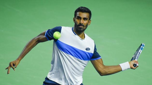 Prajnesh Gunneswaran of India in action against Yannik Maden of Germany at the TATA Open Maharashtra tournament held at Balewadi Sports Complex in Pune.(Sanket Wankhade/HT PHOTO)