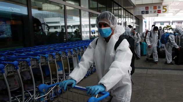 Seafarers who have spent the past months working onboard vessels arrive at the Changi Airport to board their flight back home to India during a crew change amid the coronavirus disease (COVID-19) outbreak in Singapore June 12, 2020. REUTERS/Edgar Su(REUTERS) Seafarers who have spent the past months working onboard vessels arrive at the Changi Airport to board their flight back home to India during a crew change amid the coronavirus disease (COVID-19) outbreak in Singapore June 12, 2020. REUTERS/Edgar Su(REUTERS)