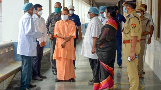 Azamgarh: Uttar Pradesh Chief Minister Yogi Adityanath interacts with medics during his visit at a hospital during ongoing nationwide COVID-19 lockdown, in Azamgarh, Monday, June 8, 2020. (PTI Photo)(PTI08-06-2020_000314B) (PTI) Azamgarh: Uttar Pradesh Chief Minister Yogi Adityanath interacts with medics during his visit at a hospital during ongoing nationwide COVID-19 lockdown, in Azamgarh, Monday, June 8, 2020. (PTI Photo)(PTI08-06-2020_000314B) (PTI)