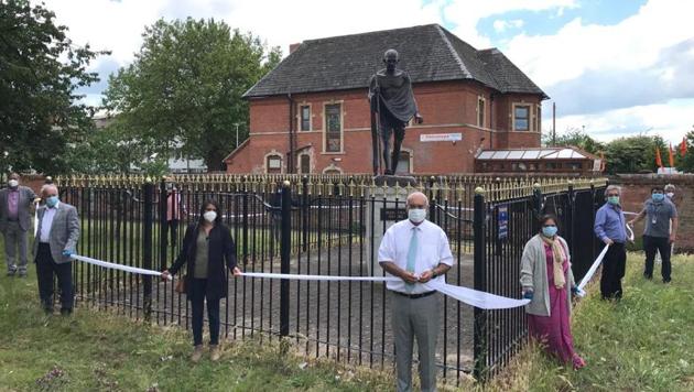 Councillors, residents and former Labour MP Keith Vaz formed a cordon on Saturday around Mahatma Gandhi’s statue in Leicester, where over 6,000 people signed a petition for the statue’s removal. (HT photo) Councillors, residents and former Labour MP Keith Vaz formed a cordon on Saturday around Mahatma Gandhi’s statue in Leicester, where over 6,000 people signed a petition for the statue’s removal. (HT photo)