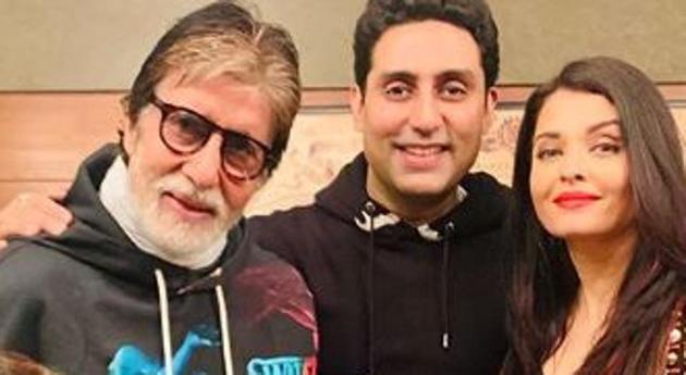 Amitabh Bachchan poses with his family.