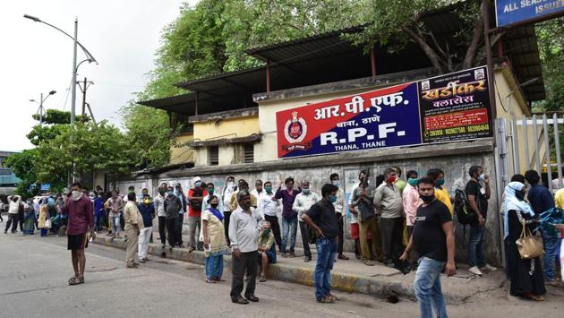People queue outside Thane railway station for refund on cancellation of railway tickets. Thane is Maharashtra’s second-worst coronavirus hit city with over 16,000 Covid-19 cases. More than 400 people have succumbed to death here, reported HT on June 13. (Praful Gangurde / HT Photo) People queue outside Thane railway station for refund on cancellation of railway tickets. Thane is Maharashtra’s second-worst coronavirus hit city with over 16,000 Covid-19 cases. More than 400 people have succumbed to death here, reported HT on June 13. (Praful Gangurde / HT Photo)
