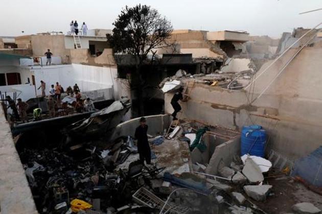 The domestic flight from Lahore to Karachi crashed in a residential area near the Jinnah International Airport in Karachi on May 22.(Reuters)