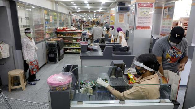 Employees and visitors seen wearing protective masks inside Grahak Peth Co Operative Departmental Store in Pune. Pune has reported over 11,000 cases with 459 deaths, as of June 13. (Rahul Raut / HT Photo) Employees and visitors seen wearing protective masks inside Grahak Peth Co Operative Departmental Store in Pune. Pune has reported over 11,000 cases with 459 deaths, as of June 13. (Rahul Raut / HT Photo)