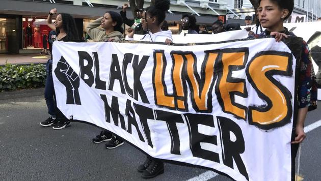 Protesters chant during a Black Lives Matter protest in central Wellington, New Zealand, Sunday June, 14, 2020. (AP photo) Protesters chant during a Black Lives Matter protest in central Wellington, New Zealand, Sunday June, 14, 2020. (AP photo)