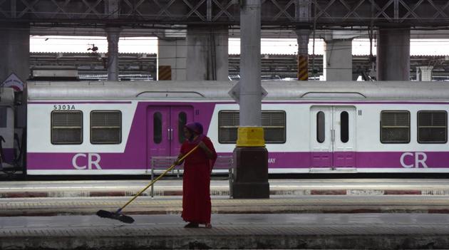 Sweepers clean the platform after CM Uddhav Thackarey demands central government to restart local ytrains for essential service staff at CSMT in Mumbai on Thursday.(Anshuman Poyrekar/HT Photo)