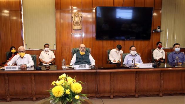 Union Home Minister Amit Shah flanked by Union health minister Harsh Vardhan (R) at a meeting on Delhi’s Covid-19 situation on Sunday. (HT PHOTO) Union Home Minister Amit Shah flanked by Union health minister Harsh Vardhan (R) at a meeting on Delhi’s Covid-19 situation on Sunday. (HT PHOTO)