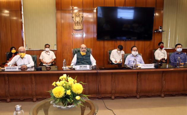 Union Home Minister Amit Shah flanked by Union health minister Harsh Vardhan (R) as he holds a meeting on Delhi’s Covid-19 situation and its response with Delhi CM Arvind Kejriwal, LG Anil Baijal, Deputy Delhi CM Manish Sisodia and others at the Home Ministry in New Delhi. (HT Photo) Union Home Minister Amit Shah flanked by Union health minister Harsh Vardhan (R) as he holds a meeting on Delhi’s Covid-19 situation and its response with Delhi CM Arvind Kejriwal, LG Anil Baijal, Deputy Delhi CM Manish Sisodia and others at the Home Ministry in New Delhi. (HT Photo)